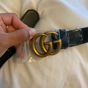 New never used black belt with gold buckle